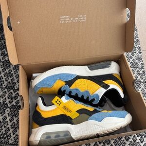 Jordan MA2 “University Gold”